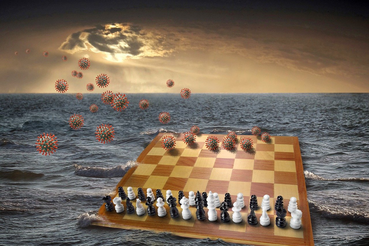 Schachbrett mit Coronaviren