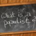 Tafel mit Aufschrift "Wha is a populist?"