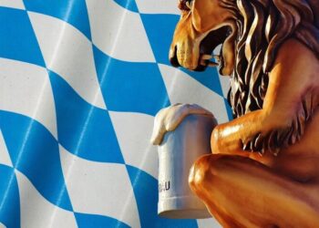 Löwe mit Bierkrug vor bayerischer Flagge