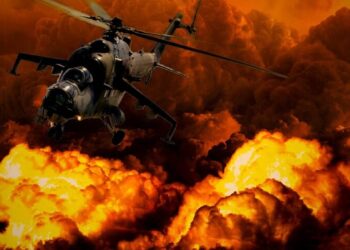 Kampfhubschrauber vor riesigem Feuerball