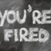 TAfelaufschrift "YOU'RE FIRED"