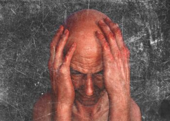 Verwirrter Mensch, schlägt die Hände auf den Kopf