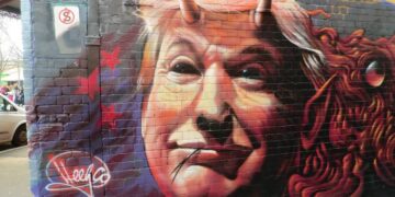 Donald Trump mit Hörnern und gespaltener Zunge. Graffiti in Melbourne, Australien