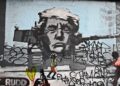 Gesicht von Trump als Turm eines Panzers, Grafitti