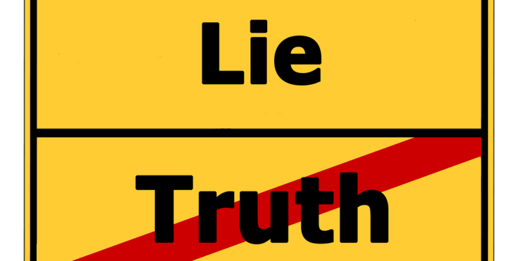Orstausgangsschild mit der Aufschrift "Lie und Truth"
