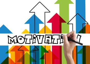 Grafik mit bunten Pfeilen und dem Schriftzug "Motivation"