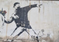 Banksy Graffiti an der Mauer zur Westbanj