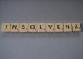 Scrabble-Würfel "insolvenz"