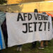 Banner für AfD Verbot auf Demonstration für Demokratie