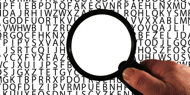 Lupe über BUchstabensalat